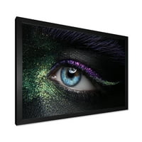 עיצוב אמנות 'עיני אישה עם פיגמנט ירוק וסגול וניצוצות' הדפס אמנות ממוסגר מודרני